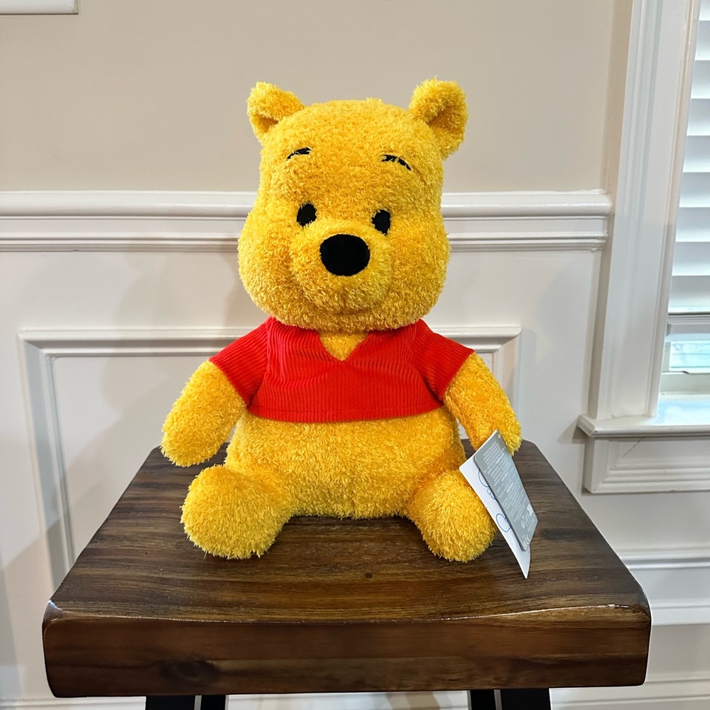 Disney Store Weighted Winnie the Pooh plush